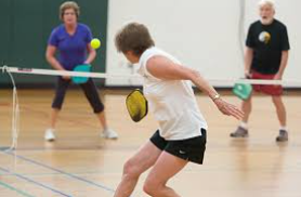 Playing Pickleball in gym